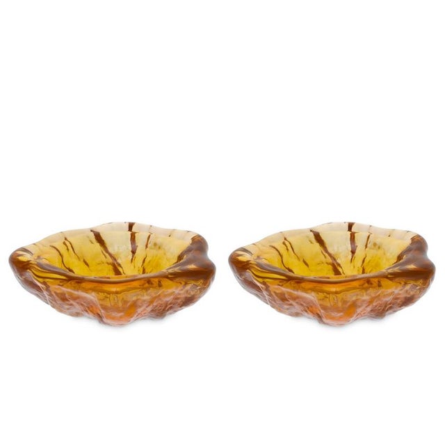 Part of an exclusive limited-edition collection, the brown glass bowl adds a layer of charm and visual interest to your...