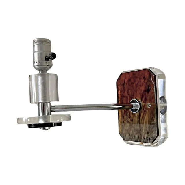 Vintage mid century modern wall lamp in clear lucite acrylic with contrasting ombré tortoiseshell and chrome hardware....