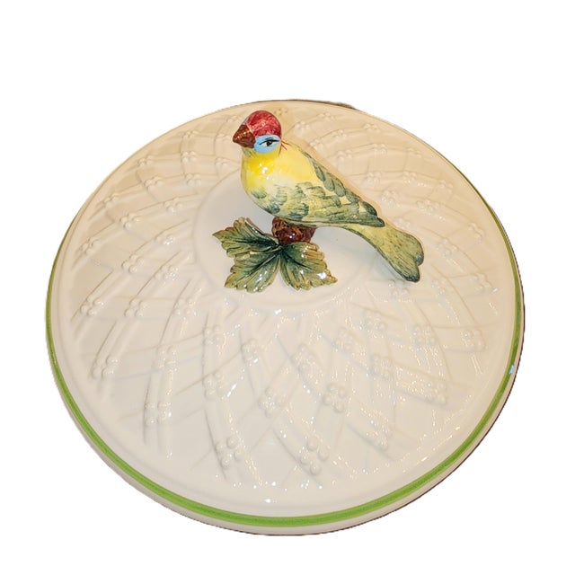 A garden design by Tiffany & Co. Featuring a decorative raised relief lattice pattern. With a bird and leaf design,...