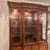 An impressive Century Furniture "Of Distinction" by Ray Sabota, china cabinet crafted in solid walnut. This cabinet...