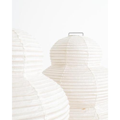 A rare, early and iconic pair of american mid century desk / table lamps model "24n" in black lacquered metal bases and...