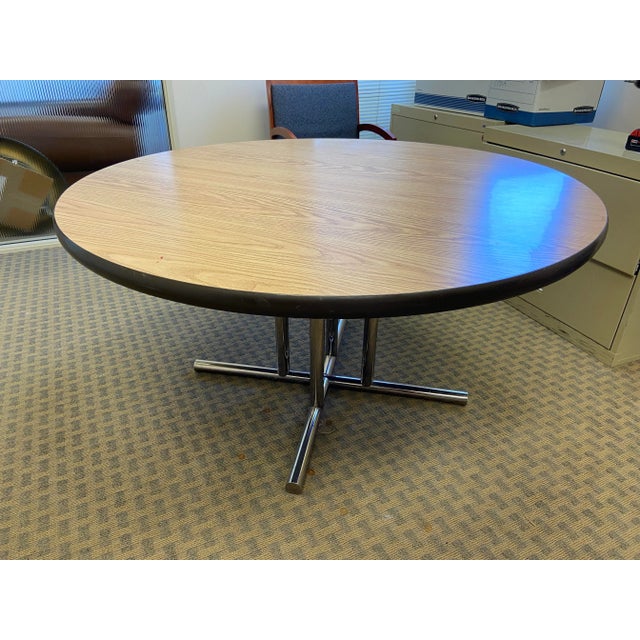 Vintage mid century modern round conference room table with laminate top and metal base , can be used as a kitchen table...