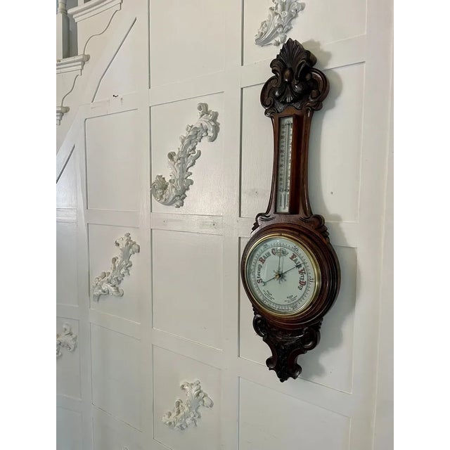 Antique Victorian quality carved oak banjo barometer having a quality carved oak shaped case with a brass bezel, porcelain...