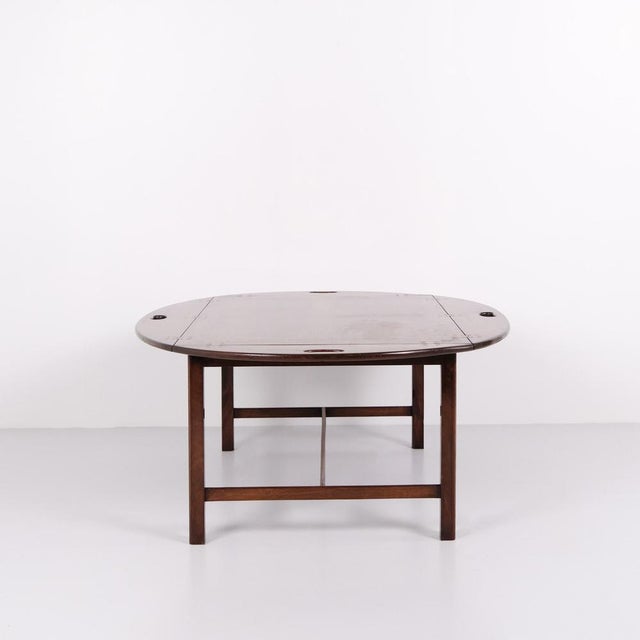 Butler table in mahogany with brass fittings from the 1930s. English design with a classic expression and functional form....