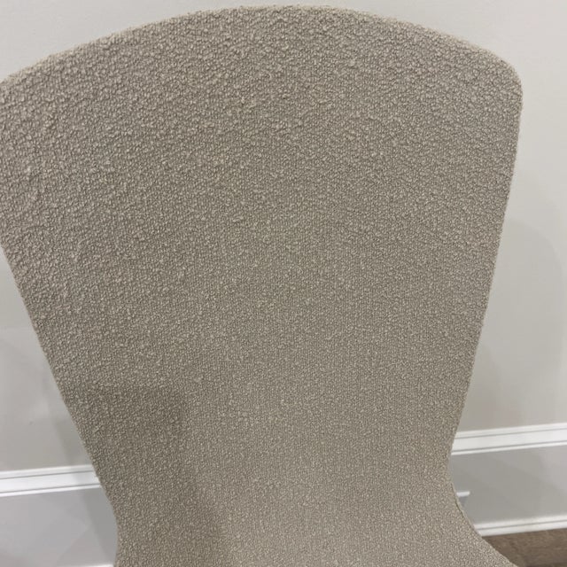 The airy seats of the Bertoia Seating Collection (1952) have a delicate, filigreed construction and a relaxed sit....