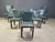 Set of 10 Arcadia dining chairs designed by Paolo Piva for B&B italia's Arcadia series. Upholstered in dark green leather....