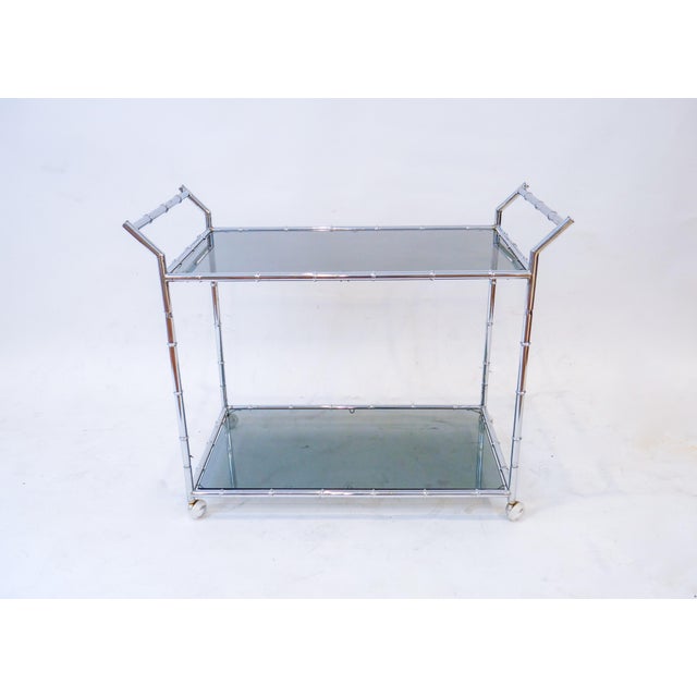 Vintage and Fabulous Chrome Bar Cart with Smoked Glass The chrome has a ribbed pattern. Glass is easily removable for...