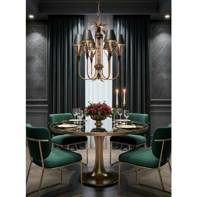 A beautiful large vintage bronze and black Regency Palm leaf chandelier in the style of Currey & Company. The chandelier...