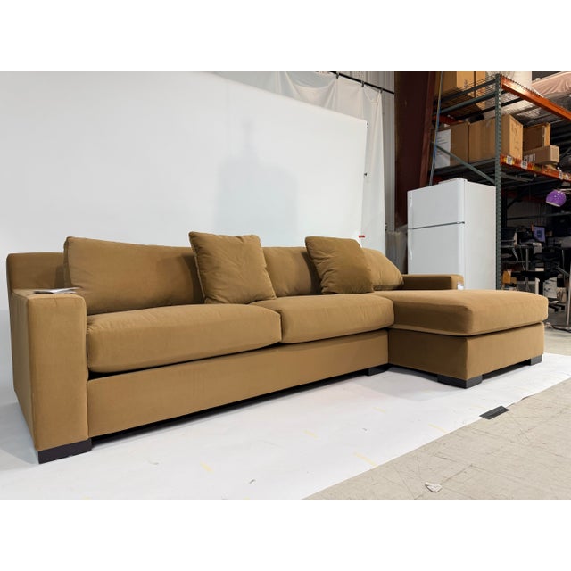 This is a beautiful clean lined sectional upholstered in a warm camel microfiber that feels soft, inviting and wonderfully...
