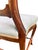 A rare and unusual antique parlor chair in rosewood with carved backrest and upholstered seat. Dating from the mid-late...
