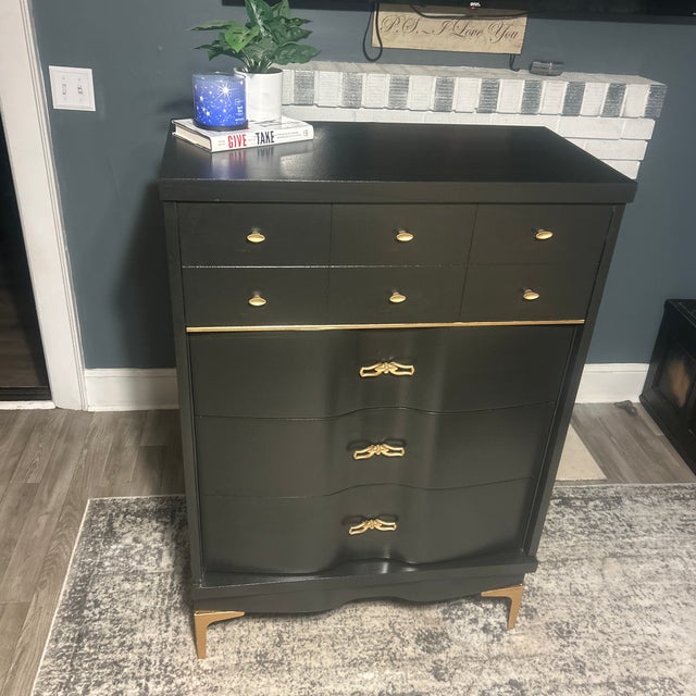Beautiful vintage French dresser professionally refinished in a rich matte black with luxurious gold accents. This one-of-...