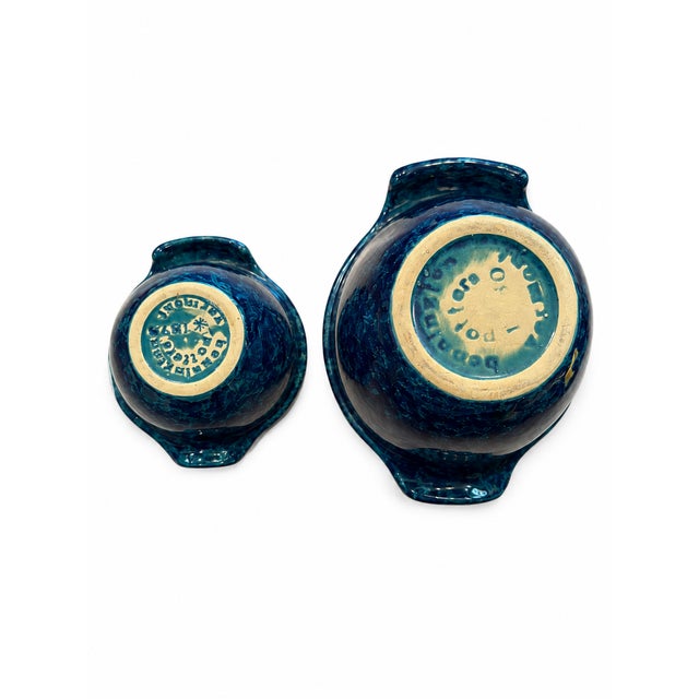 A beautiful set of two vintage nesting stoneware bowls by Bennington Potters of Bennington, Vermont, featuring the...