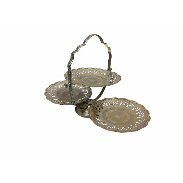 Overview An elegant and highly functional vintage 3-tier folding dessert server, proudly stamped "Made in England."...