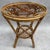 Round rattan side table from the 1950s. Handmade in the south of France. Low tabletop, 25 cm high.