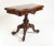 Elegant period Victorian games table in rosewood We date this to circa 1860 Top opens out to reveal green beize lined...