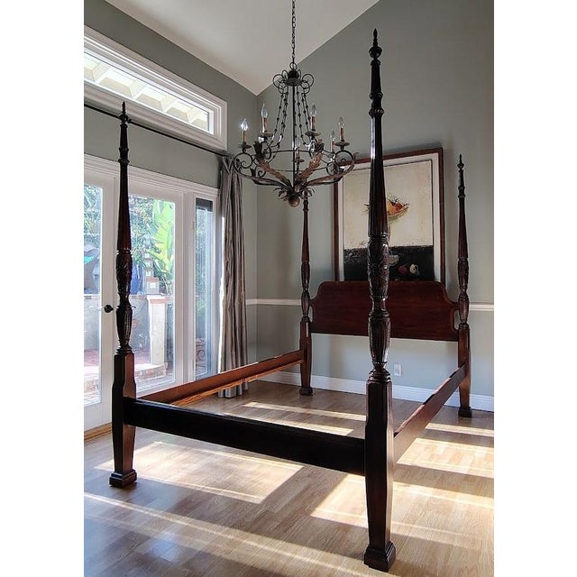 This is a beautiful mahogany poster bed with detailed rice carvings and fluting on the posts, and the headboard has...