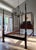 This is a beautiful mahogany poster bed with detailed rice carvings and fluting on the posts, and the headboard has...