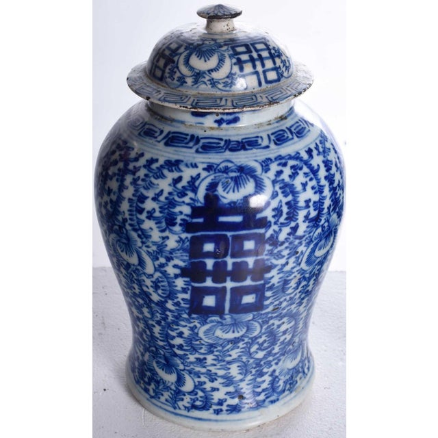 baluster form, blue and white underglaze, foliate scrollwork and floral designs, lids and bodies with four shuangxi...