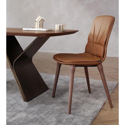 Coco cognac leather and walnut chair by morica design dimensions: d 61 x w 47 x h 91 cm. Materials: cognac leather,...