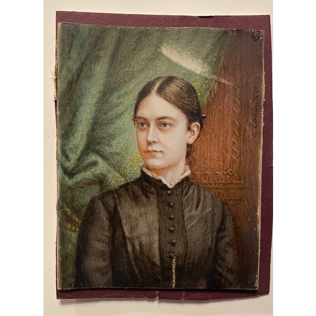 19th century portrait miniature of a woman, signed "R. Cominave" on the right edge, framed in a gilt wood frame....
