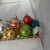 Nice collection of 14 different Christmas ornaments. Some are Mercury glass, some stenciled with mica, there are three...