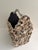 Large vintage wooden basket covered with natural seashells, including scallop shells, spiral shells, and assorted beach...