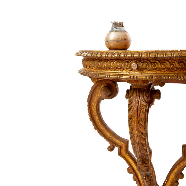 Pair of consoles, gilded carved wood, decorated with beads and gypsum acanthus leaves. The drawers have brass knobs....