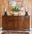 Handcrafted in Italy from solid walnut, this French Provincial style sideboard features a warm distressed finish that...