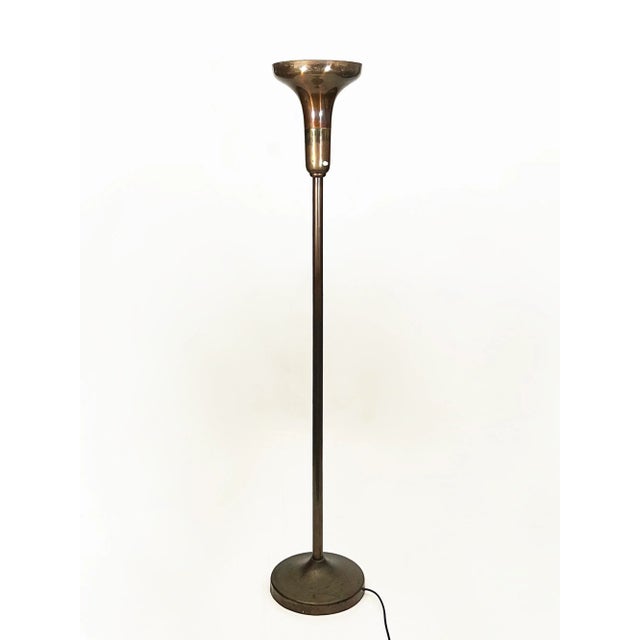 The Alfa floor lamp produced by Luminator in the 1930s has become a true icon, with many publishers copying its design to...