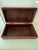 Large rectangular crocodile-embossed leather storage box. Stunning dark reddish-brown hue. Features traditional brass...