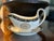 Beautiful gravy boat and saucer. Will add elegance to your tablescape.