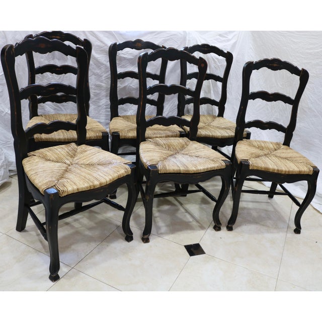 French Oak Dining Chairs With Rush Seats. The chairs are ebonized and distressed with classic French Country Farm House...