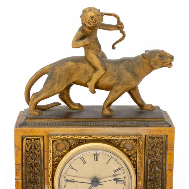 French Empire Style Cupid Riding Panther Mantel Clock, gilt metal mounted siena marble, brass clock face marked "Quartz"...