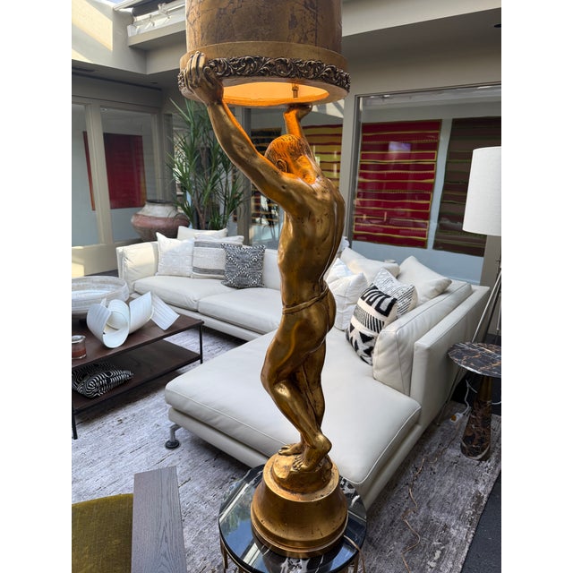 Mid-Century Figural lamp. 68” tall. Very campy and fun statement piece that is always a great conversation starter.