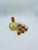 A set of Art Deco-style liqueur decanters and glasses, crafted from high-quality glass. The set features a distinctive...