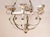 Distressed white Farmhouse rustic chandelier, requires six pillar candles. Flameless pillar's can also be used.