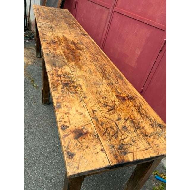 Stunning wooden workshop side table (fir). This table boasts generous dimensions: 300 x 60 cm. Height: 90 cm. with its...