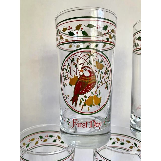 Here is a fantastic set of TWELVE glasses by Anchor Hocking featuring all the 12 Days of Christmas. Each glass is unique!...