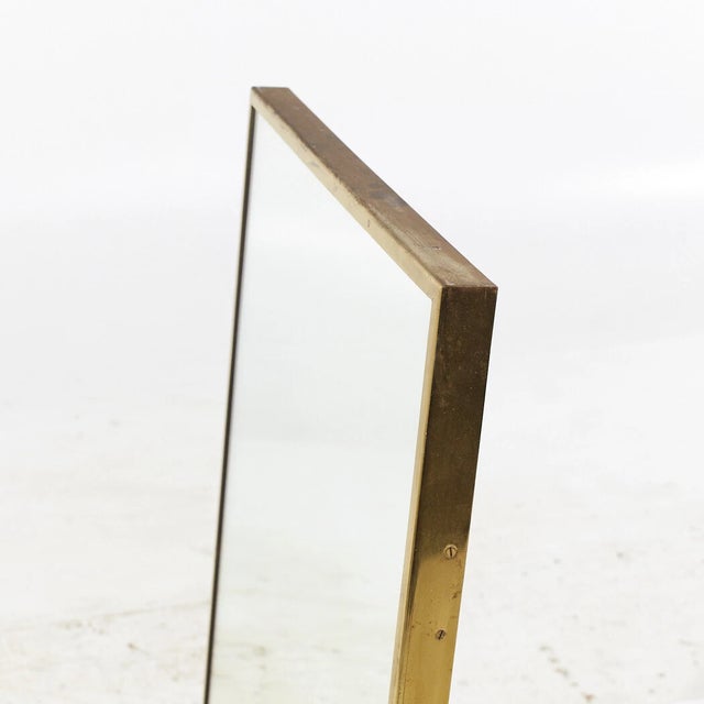 Description An immaculate Paul McCobb oblong mirror for Calvin Furniture c 1950's with original brass tag on the back. In...