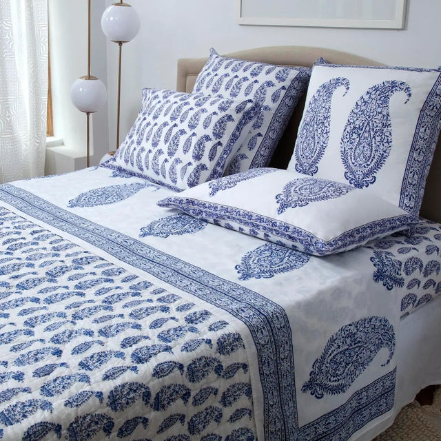 The Malabar Large Paisley pattern displays a bold intricate paisley motif reminiscent of classic Indian design. A...
