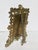Gothic-style brass photo frame. The measurements are 10.75" and 8.5" wide. The window is 5.5" by 3.75". Cast in deep...