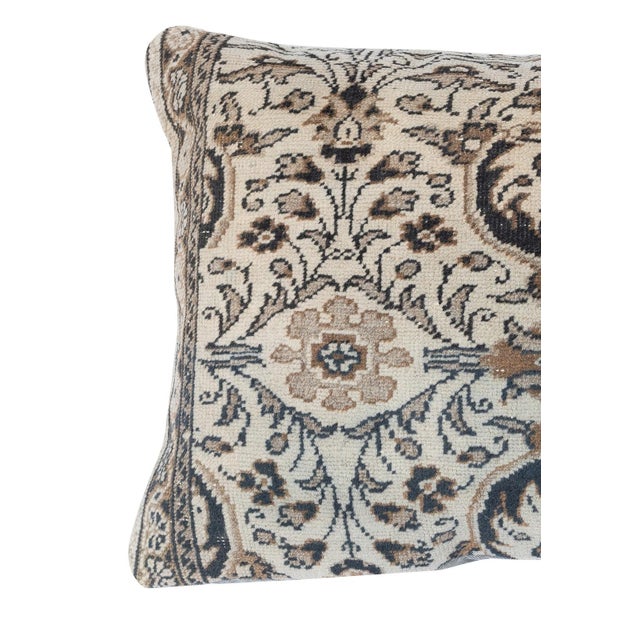 Add a touch of history and warmth to your space with this vintage handmade Turkish wool rug cushion cover. Crafted from...