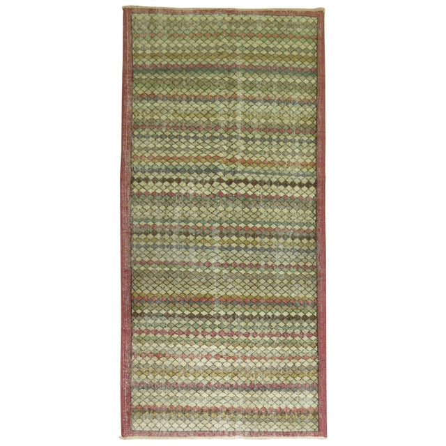 a fun small runner size mid 20th century Turkish Deco rug with a repetitive diamond motif throughout 3'6'' x 7'1''