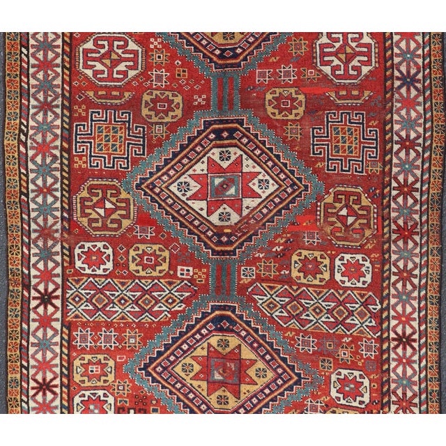 Islamic Antique Qashqai Rug With Geometric Motifs in Red, Blue, and Golden Yellow For Sale - Image 3 of 13