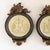 A handsome pair of neoclassical figural wall reliefs featuring classical Roman-inspired scenes rendered in raised ivory-...