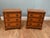 Pair of elegant burr walnut bachelor bedside chests in the Georgian Revival taste Each chest features three graduating...