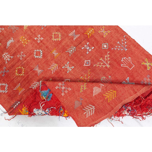 Vintage Moroccan Kilim Rug Size: 3'0" × 4'8" (91 × 142 cm) This vibrant 1945 Moroccan Kilim rug is a captivating example...