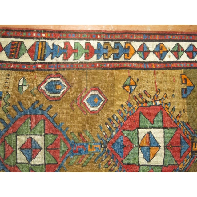 An early 20th century tribal camel ground Persian Serab runner. Measures: 2'7'' x 9'4''.