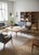 A wonderful Danish sofa group with a pretty three-seater sofa and a pair of armchairs. The whole group is newly dressed in...
