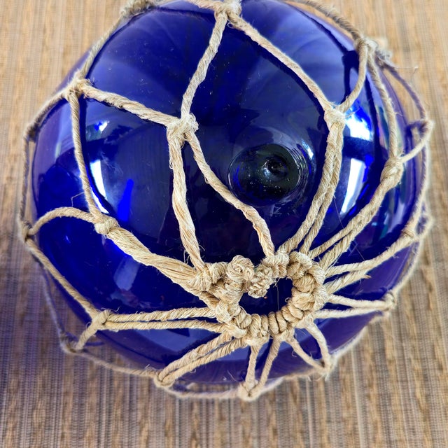 Vintage Pair of Rare 8" Cobalt Blue Hand-Blown Glass Fishing Floats · Original Jute Net For Sale - Image 4 of 7